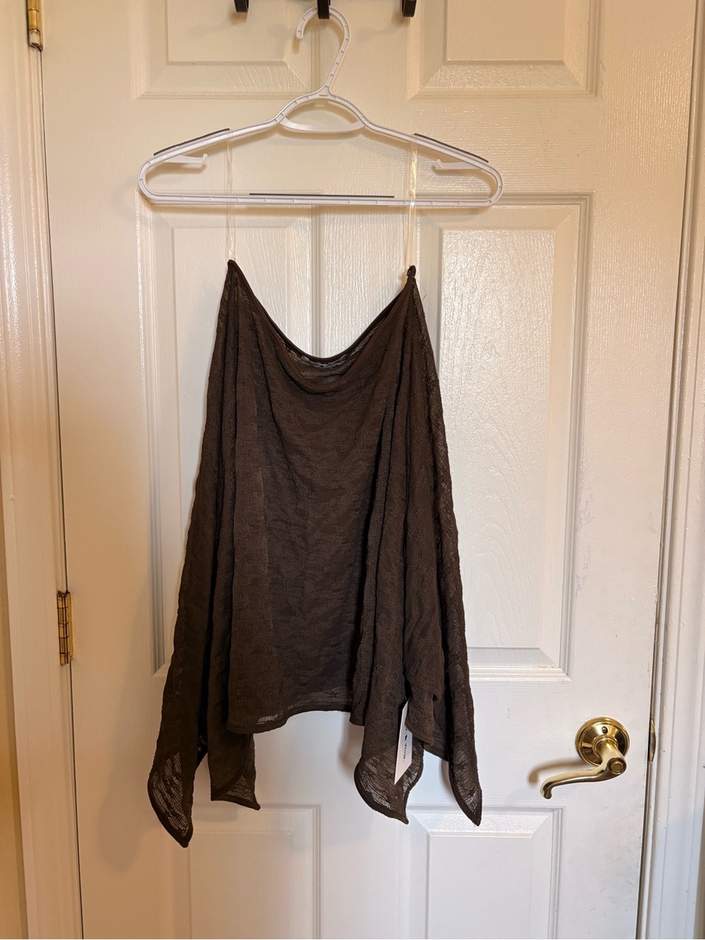 brown lace shawl or skirt with draped hem
